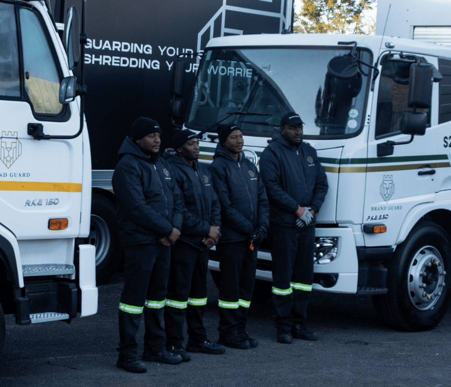 Brand Guard uniformed operators in front of the shred fleet